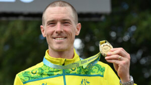 Rohan Dennis of Australia poses with his medal