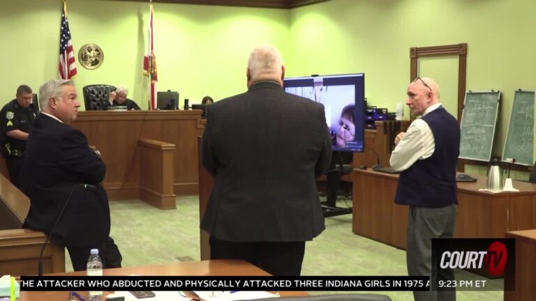 people stand inside court