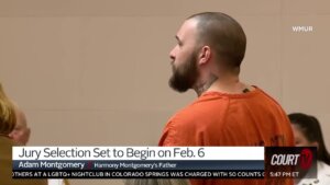 Adam Montgomery stands in court