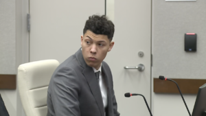 Jackson Mahomes sits in court