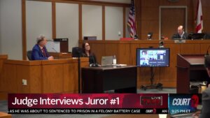 courtroom with judge and witness on stand