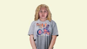 a forensic sketch of a woman in a motorcycle tshirt