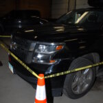 car and crime scene tape