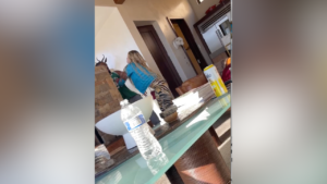 woman attacks man in still from video