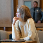 Michelle Troconis sits in court