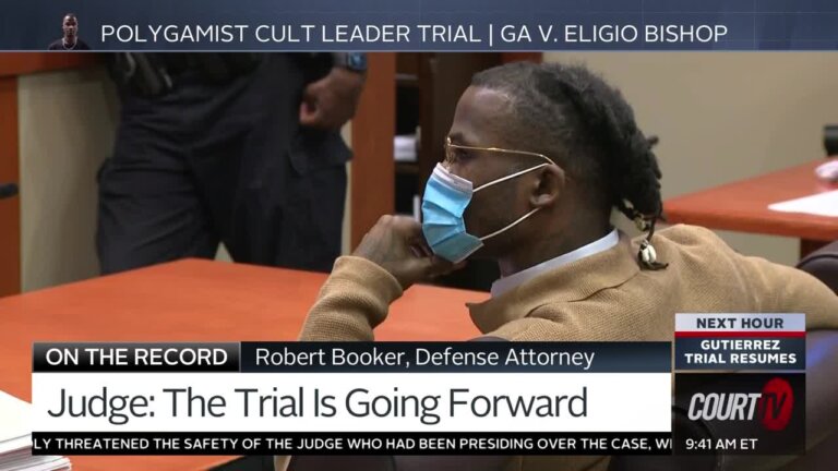 Eligio Bishop sits in court wearing a mask