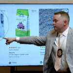 Max Rahill points to picture of a bag of lime believed to used to decompose the body of Harmony Montgomery