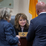 Judge Mary Marlowe Sommer, center, talks with prosecutor Kari Morrissey, left, and defense attorney Jason Bowles