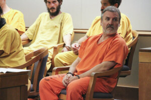 Brian Steven Smith sits in a courtroom