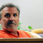 Brian Steven Smith sits in a courtroom