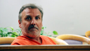 Brian Steven Smith sits in a courtroom