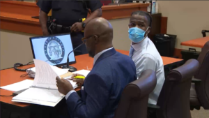 Eligio Bishop sits in court in a mask