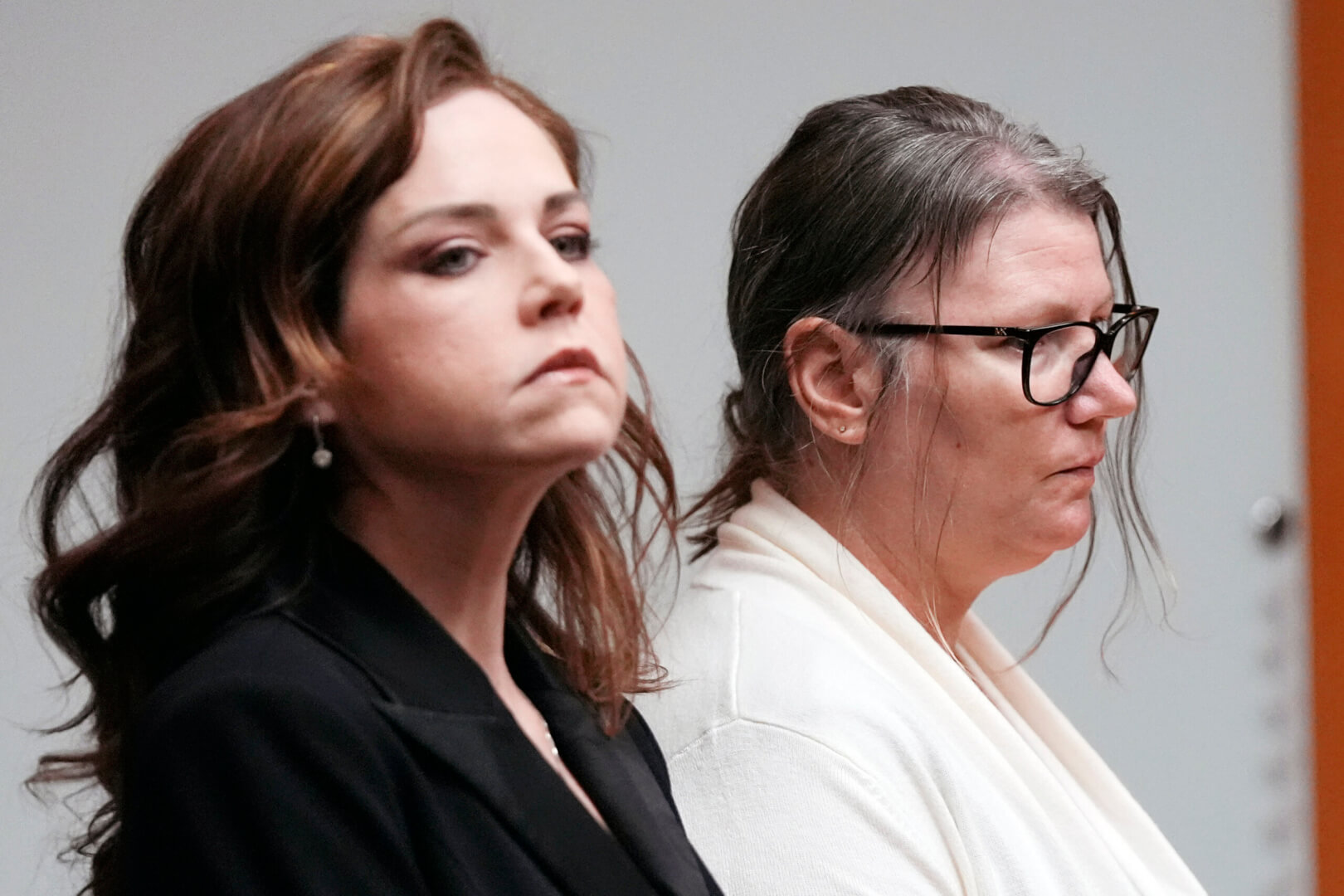 Jennifer Crumbley and her attorney stand in court