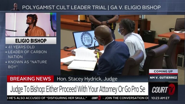 Eligio Bishop sits with his attorneys in court