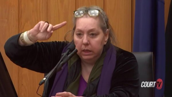 Beverly McCallum gestures while testifying