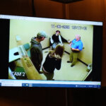 In a frame grab from video, Investigators meet with James Crumbley