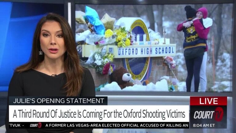 Julie Grant with a photo of the Oxford High school sign on the monitor.