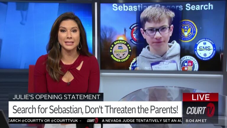 Julie Grant at the desk with a photo of Sebastian on the monitor.