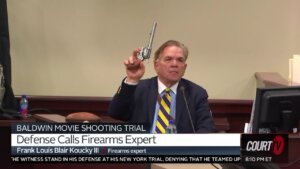 Firearms expert, Frank Koucky displays questionable gun safety measures as he takes the stand.