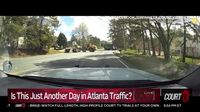 Cop uses front-end loader to stop front-end loader.