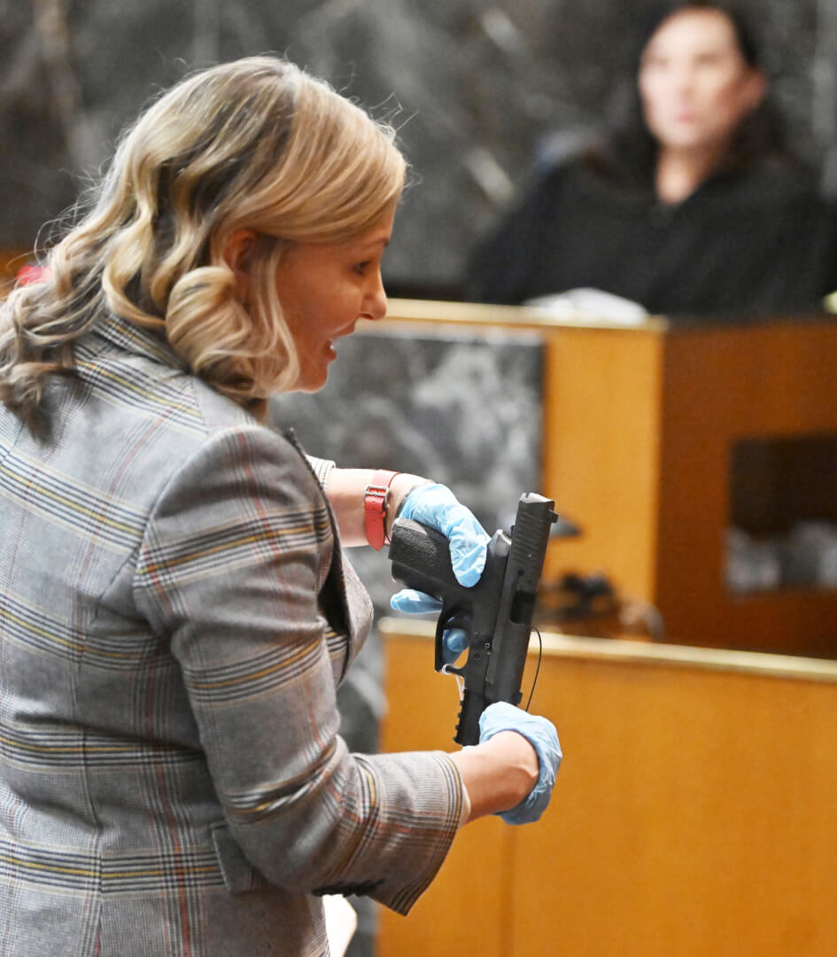 prosecutor displays gun