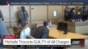 Michelle Troconis and her attorneys listen to verdict.