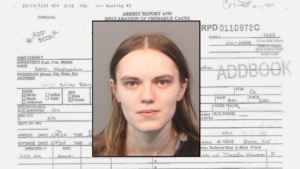 Mashenka Reid booking photo over copy of affidavit