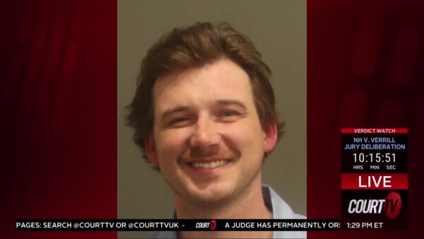 Smiling mugshot of Morgan Wallen