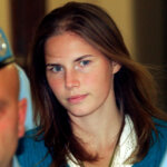 amanda knox escorted by police