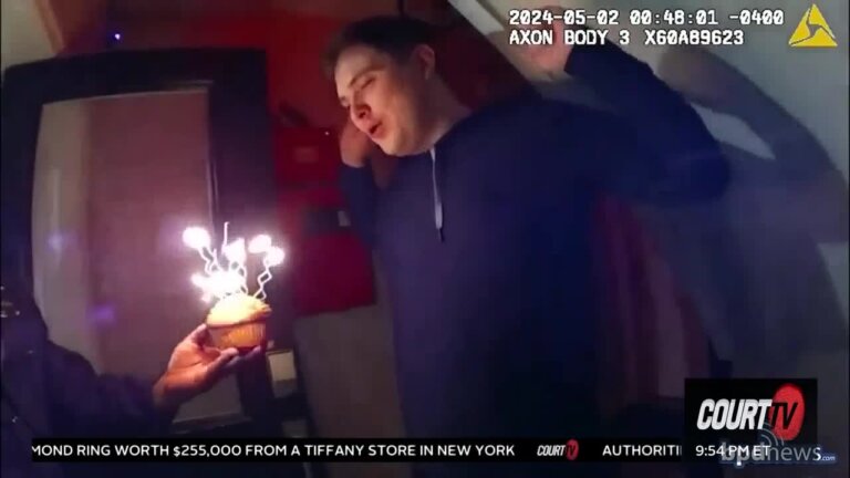 Man blows out candles.