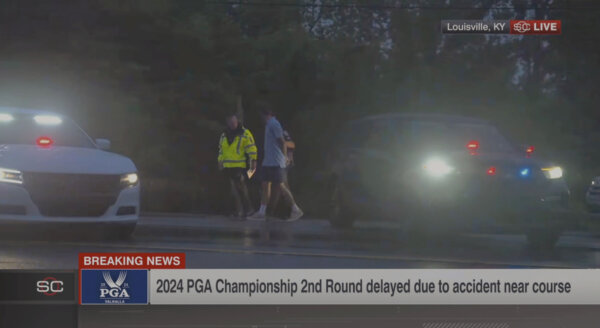 screen grab of television display showing golfer's arrest