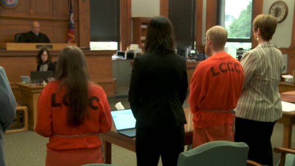 defendants appear in court