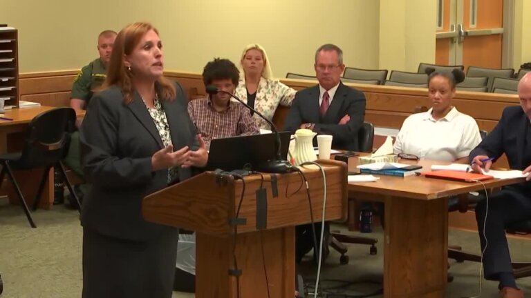 Prosecutor Abby Wallace gives the closing argument emphasizing, 'They chose to allow their mother to lay in her own filth. They chose to allow her back...to rot until she died. The defendants willfully and knowingly neglected a vulnerable adult.'