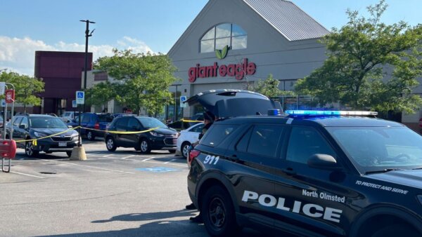 Police tape in a Giant Eagle Parking lot