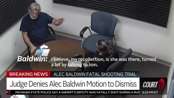 Surveillance video shows Alec Baldwin in an interrogation room