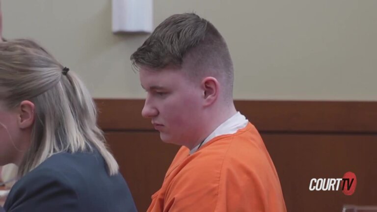 Logan Kruckenberg-Anderson sits in court