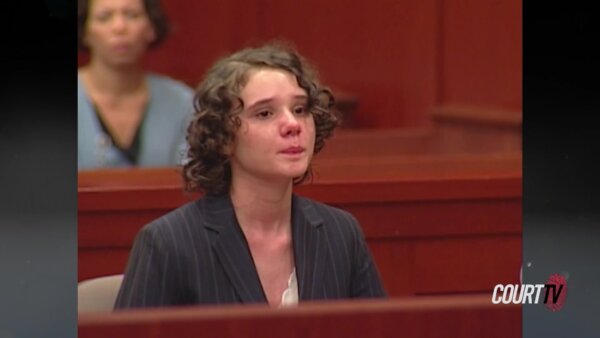 Young woman crying in court