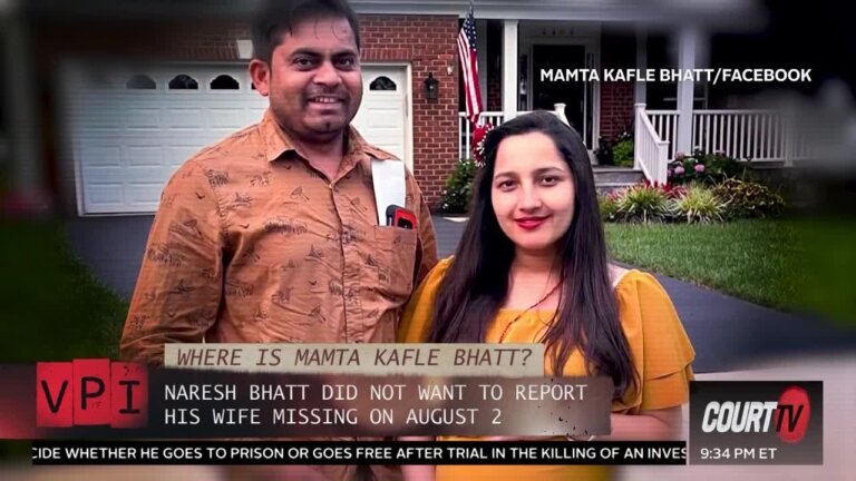 photo of woman and man outside their home