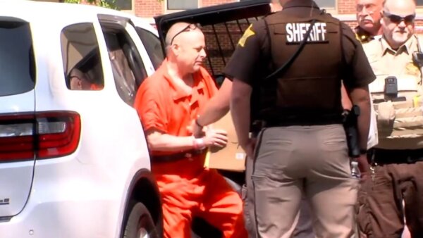 Richard Allen escorted in cuffs.