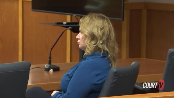 Woman Laurie Shaver sits in courtroom