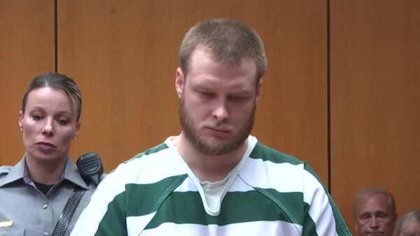 Christopher Gregor stands in court during sentencing