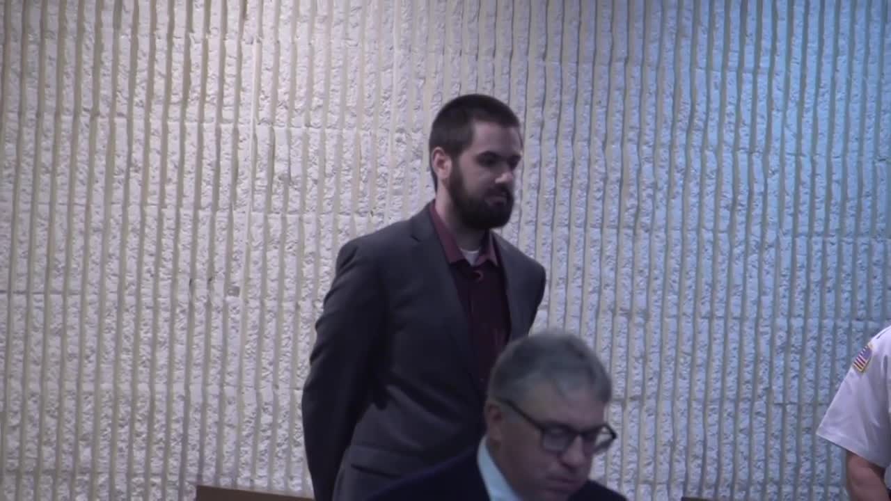 A man stands in court