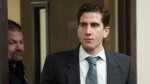 man walks into court