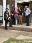 Alissa McCommon is arrested outside a house