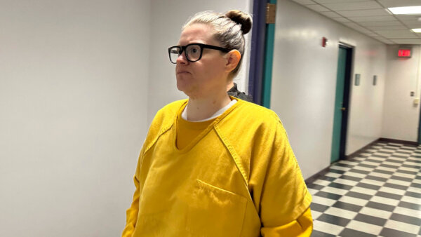 Lisa Snyder wearing yellow prison clothes