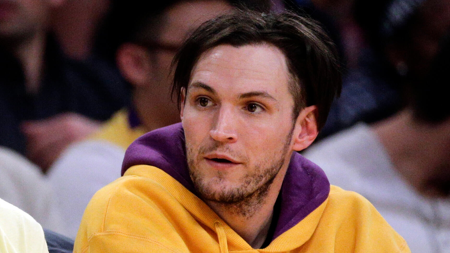 Josh Klinghoffer in yellow and purple hoodie