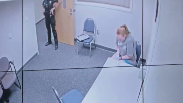 Bree Kuhn sits in interrogation room