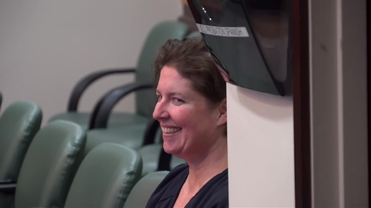 Sarah Boone smiles in court