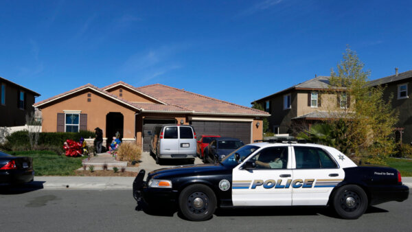 police car parked outside home