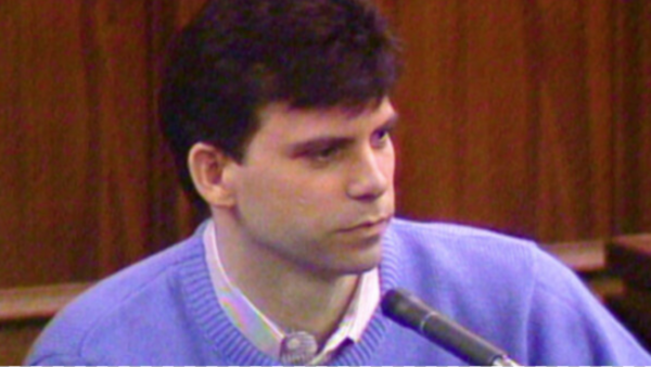 young man on stand in court